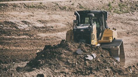 dozing with a track skid steer|Dozing Operating Tips .